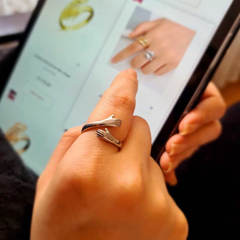 Silver Embracing Hands Ring