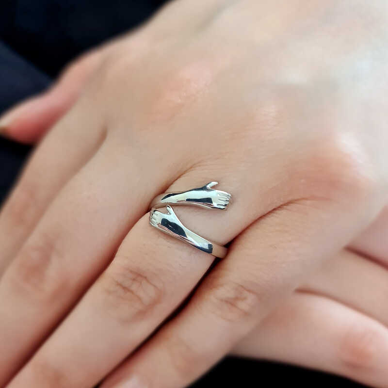 Silver Embracing Hands Ring